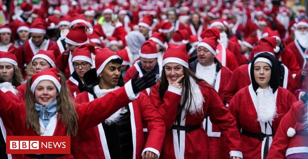 In_pictures In pictures: Santas brave rain for Glasgow charity run
