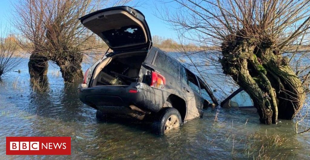 Environment Cars abandoned on flooded Fens road by suspected hare coursers